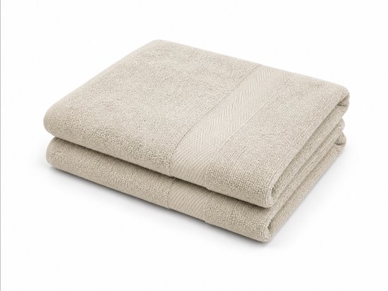 Twee beige badhanddoeken gestapeld, met een decoratieve horizontale streep op de rand.