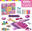 Knutselspullen uit "The Big Creative Craft Box": lijm, glitter, pompons, gekleurd papier en veren.