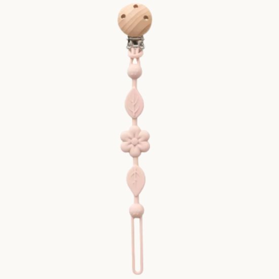 Roze speenkoord met houten clip, bloemen- en bladmotieven.