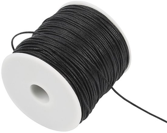Zwart katoenkoord op een witte spoel, 1 mm breed.