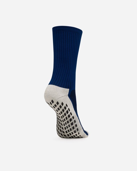 Zij-aanzicht van donkerblauwe sok met beige gripzool.