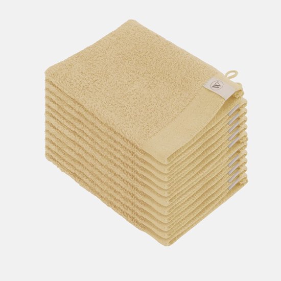 Stapel maisgele washanden van 100% katoen met een label.