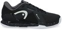 Zwarte tennis schoen met witte spetters op de zool, witte veters en een witte HEAD logo op de zijkant.