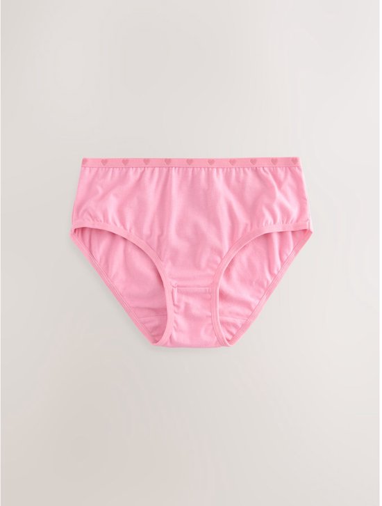 Lichtroze slip met een elastische tailleband met kleine hartjespatroon.