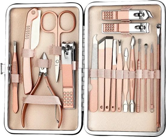 Zilverkleurige etui met een roze manicure set. Bevat scharen, knippers, pincetten en meer.