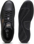 Zwarte sneakers, bovenkant en zool. Gouden Puma-logo op de binnenzool.