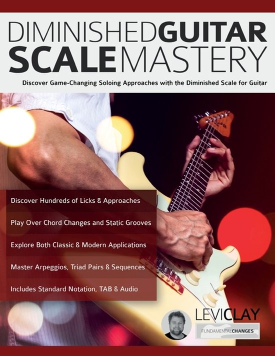 Livre 'Diminished Guitar Scale Mastery' avec des mains tenant une guitare. Découvrez des approches de solo avec la gamme diminuée.
