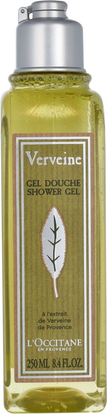 Doorzichtige gele douchegel in een vierkante fles met een zilveren dop. Het label is groen met een beige rand en toont een witte bladprint en tekst.