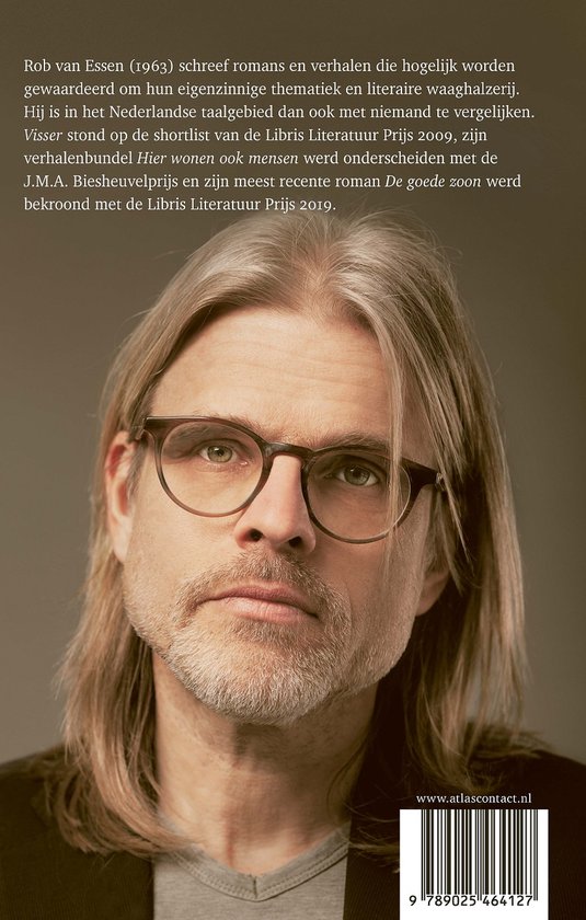 Close-up portret van Rob van Essen met lang blond haar, baard en bril.