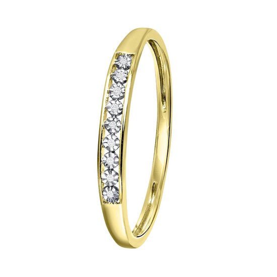 Bague en or sertie de 9 diamants alignés. La bague scintille.