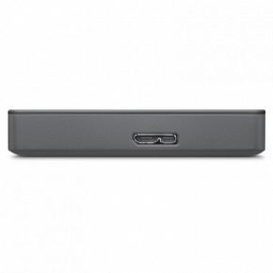 Zijaanzicht van een grijze Seagate Basic 1TB externe harde schijf met USB-poort.