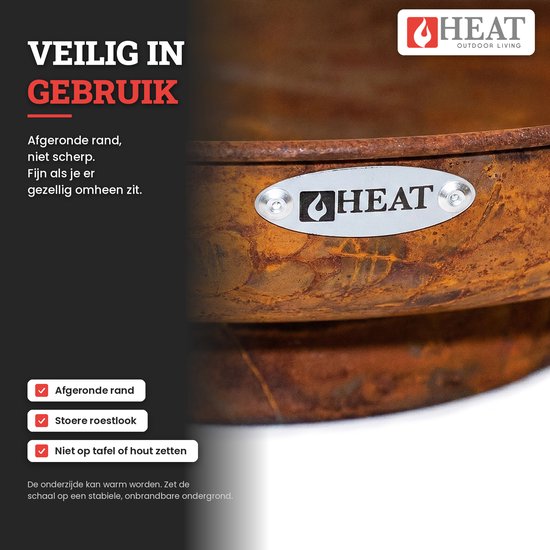Close-up van het HEAT-logo op een roestkleurige stalen vuurschaal met een veilige, niet-scherpe afgeronde rand.
