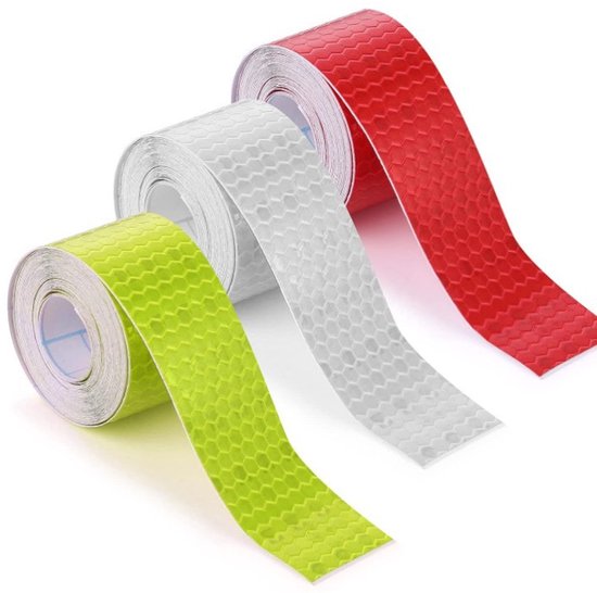 Drie rollen reflecterende tape in rood, wit en groen, met honingraatpatroon.