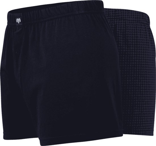 Set van twee Ceceba boxershorts, een effen marineblauwe en een met donkerblauw pied-de-poule motief.