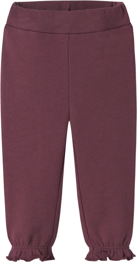 Bordeauxrode joggingbroek voor meisjes met elastische tailleband en gerimpelde broekspijpen.