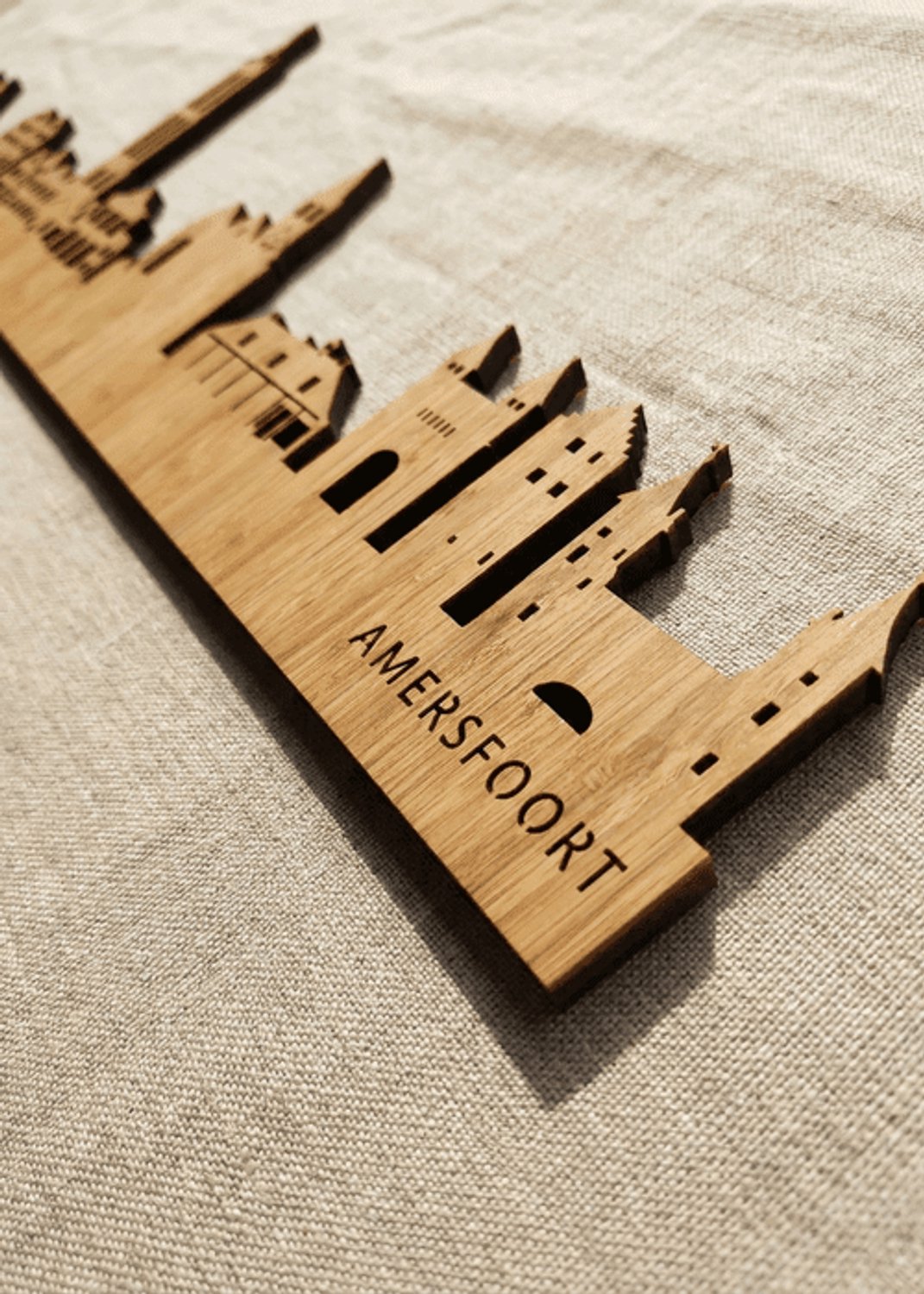 Houten Skyline Amersfoort | Wanddecoratie voor aan de muur | Bamboe | 70 x 14 cm