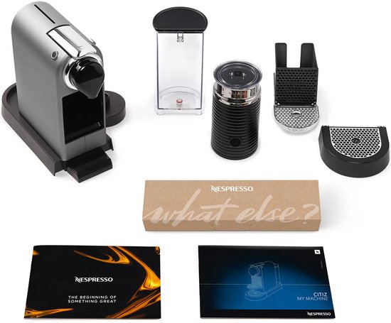 Nespresso Citiz & Milk set met machine, melkopschuimer, watertank, lekbakjes, verpakking en handleidingen.