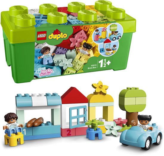 Groene LEGO DUPLO opbergdoos naast een speeltafereel met huisje, boom en auto.