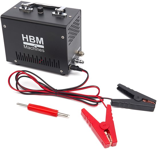 Zwarte rooklekdetector met HBM Machines logo, rode en zwarte kabels met krokodillenklemmen.