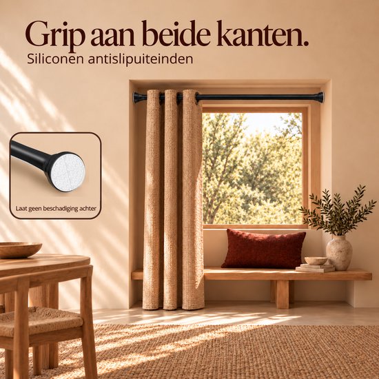 Gordijnroede met siliconen antislip uiteinden voor wandmontage. Tekst: Grip aan beide kanten. Laat geen beschadiging achter.