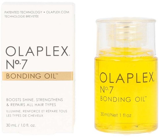 Olaplex Nº7 Bonding Oil, een heldergele haarolie in een glazen flesje van 30 ml.