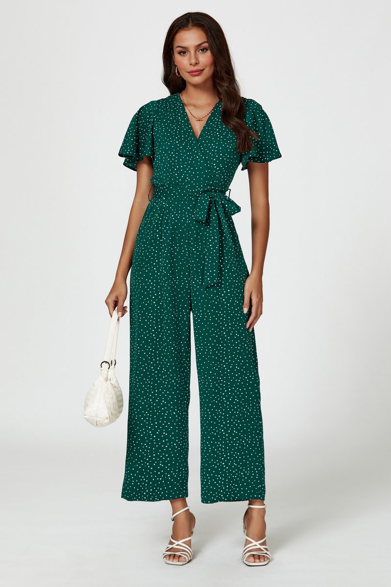 Jumpsuit met stippenprint en wikkeltop in groen