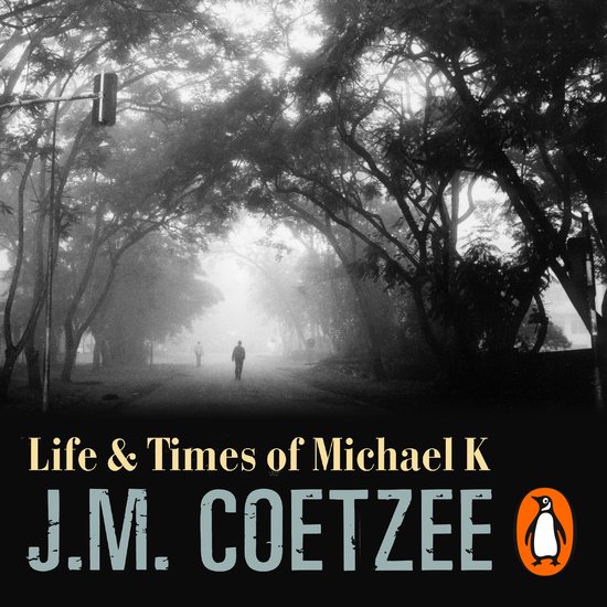 Boekcover met de titel 'Life & Times of Michael K' van J.M. Coetzee, met een sfeervolle, mistige afbeelding van een laan met bomen en twee figuren.