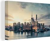 Canvas Schilderij Skyline - Water - Shanghai - 120x80 cm - Wanddecoratie
