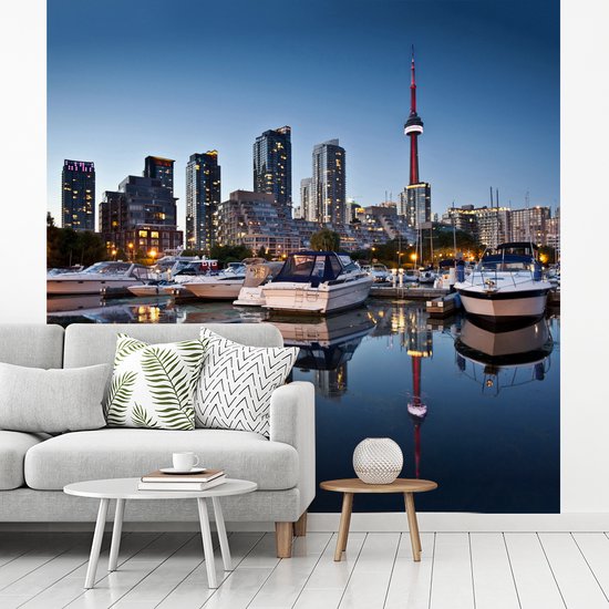Behang - Fotobehang De gebouwen van Toronto weerspiegelen in het water - Breedte 220 cm x hoogte 220 cm - Nr1Wallpaper