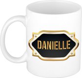 Danielle naam cadeau mok / beker met gouden embleem - kado verjaardag/ moeder/ pensioen/ geslaagd/ bedankt