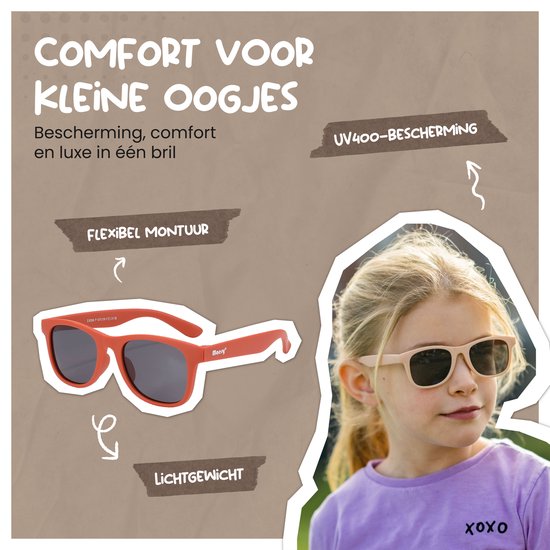 Oranje Maesy kinder zonnebril, flexibel montuur, lichtgewicht en UV400 bescherming, gedragen door een meisje.