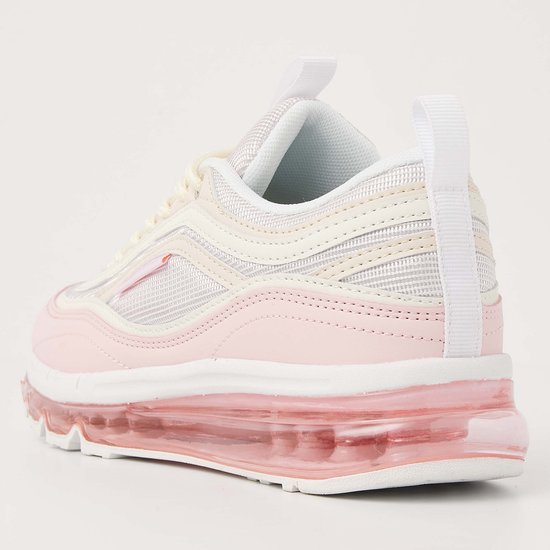 Roze, nude en witte lage sneaker van British Knights. Laag model met veters en doorschijnende roze zool.