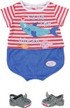 Baby Born pyjama met 'Save the Ocean' shirt, blauwe broek en grijze haaienschoentjes.