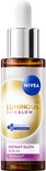 Flesje NIVEA Luminous630 Instant Glow Serum met gouden cirkel en een paarse accentstrook.