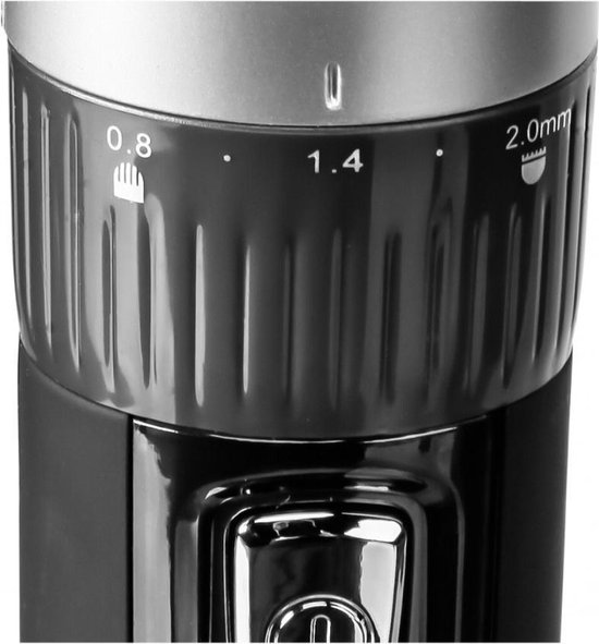 Detail van de lengte-instelling op een Remington tondeuse, met markeringen 0.8, 1.4 en 2.0mm.