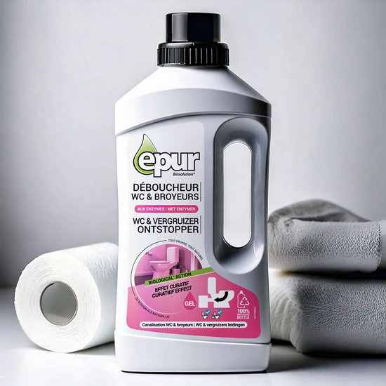 Epur WC & vergruizer ontstopper fles, gefotografeerd naast toiletrollen en handdoeken.