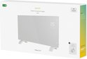 Verpakking van een witte glazen convectorverwarming met "Smart Convection Heater" opdruk, details over wifi en "A smart home for everyone".