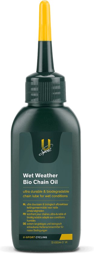 Donkergroene fles met gele dop, met etiket 'Wet Weather Bio Chain Oil'.