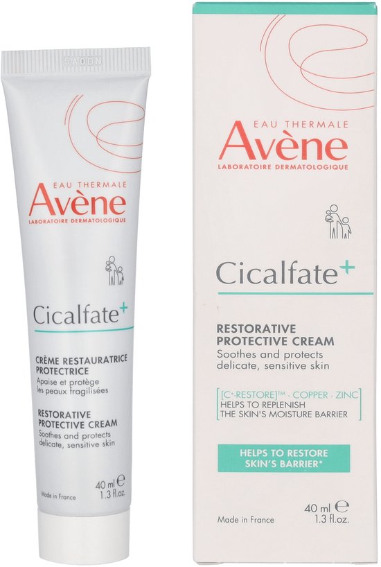 Witte tube en doosje met rode en grijze tekst. Avene Cicalfate+ creme helpt de huidbarrière herstellen.