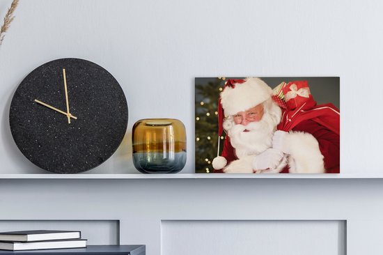 Un portrait du Père Noël portant un sac rouge sur son épaule toile 30x20 cm - petit - Tirage photo sur toile (Décoration murale salon / chambre)