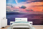 Behang - Fotobehang Santorini Griekenland bij zonsondergang - Breedte 600 cm x hoogte 400 cm