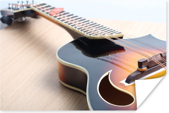 Une guitare électrique sur un plancher en bois Poster 90x60 cm - Tirage photo sur Poster (décoration murale salon / chambre)