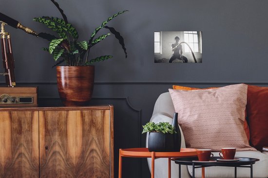 Affiche - Une femme s'entraine avec deux cordes - 30x20 cm