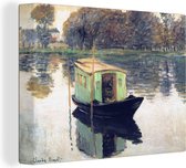 Canvas Schilderij De atelierboot - Schilderij van Claude Monet - 80x60 cm - Wanddecoratie