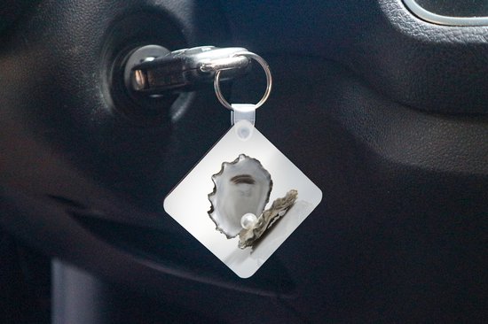 Porte-clés - Perle dans une huître - Plastique