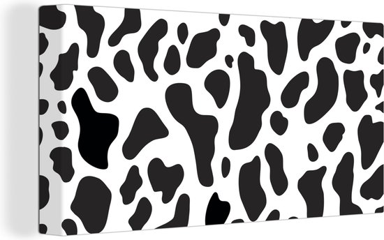 Peinture sur toile Une illustration du motif à pois d'une vache - 40x20 cm - Décoration murale