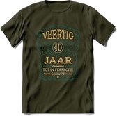 40 Jaar Legendarisch Gerijpt T-Shirt | Aqua - Ivoor | Grappig Verjaardag Cadeau | Dames - Heren | - Leger Groen - L