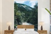 Behang - Fotobehang De woeste Soca Rivier in de Tolmin kloof in het Nationaal park Triglav - Breedte 225 cm x hoogte 350 cm