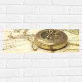 Muursticker - Gouden Kompas op Wereldkaart - 60x20 cm Foto op Muursticker
