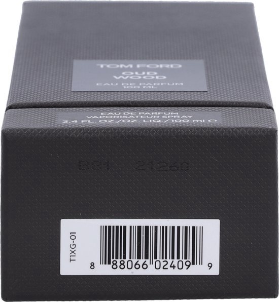 Zwarte kartonnen verpakking van Tom Ford Oud Wood Eau de Parfum 100 ml, met barcode.